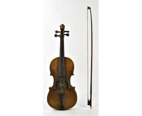 A full size German violin, Stradivarius copy, with lion carved scroll, the two-piece back length 36cm, with a Baroque style b