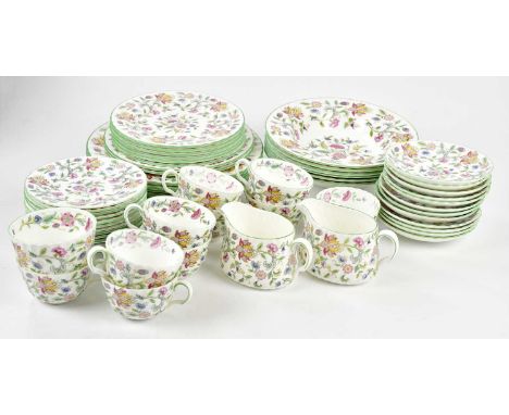 MINTON; a fifty-eight piece part tea and dinner service in the 'Haddon Hall' pattern.Condition Report: No 27cm dinner plates 
