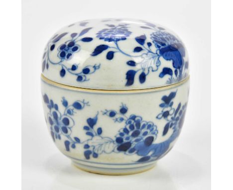 A 19th century Chinese blue and white porcelain box and cover with floral decoration, height 8cm, diameter 8.5cm.Condition Re