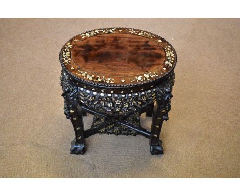 A late 19th century Chinese rosewood jardinière stand with mother of pearl inlaid decoration, on four ball and claw feet, len