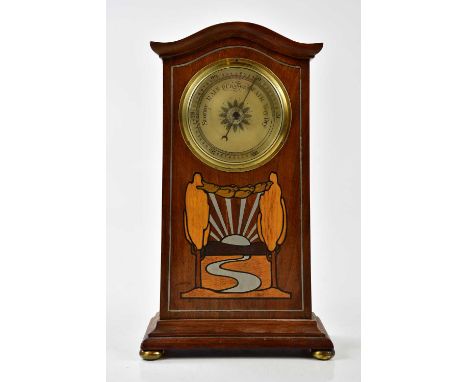 An Art Nouveau mahogany cased and inlaid barometer, height 31cm.Condition Report: No makers name on barometer.