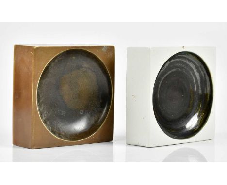 TROIKA; two square dishes comprising a manganese example inscribed Troika, width 12cm, the second with a manganese glazed cen