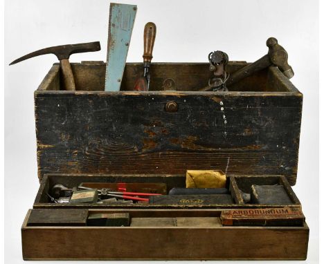 A large collection of tools to include a metal gauge, wire cutters, wood working planes, hand drills, chisels, etc.