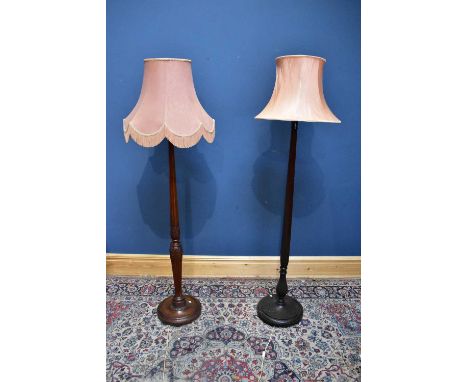 A caved mahogany standard lamp with fluted column and another with hexagonal column (2).