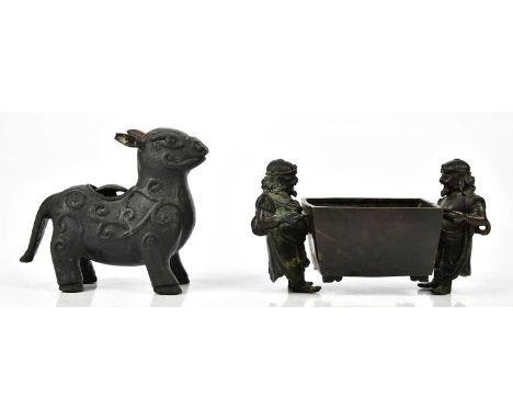 A Chinese bronze figural bowl with central rectangular reservoir being carried by twin bearded figures, length 21.5cm, also a