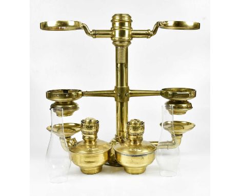 A US railroad coach double brass roof ventilating oil lamp, with enamelled shade, height 58cm.