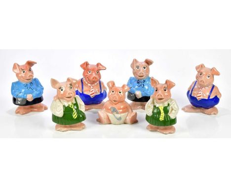 WADE; a collection of seven NatWest pig money banks (7).Condition Report: Light surface wear , three examples missing base bu