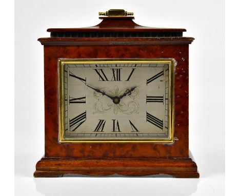 A 20th century burr walnut cased mantel clock, the silvered dial set with Roman numerals with French movement, height 22cm.Co