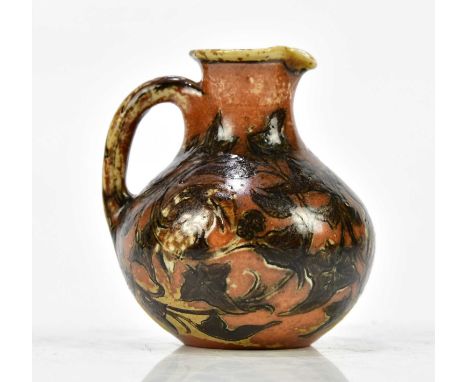 MARTIN BROTHERS; a miniature jug of bulbous form with incised floral decoration depicting wally birds perching with floral sp
