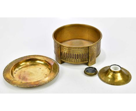 HUGH WALLIS; an Arts &amp; Crafts style brass inkwell and cover with pinched rim, diameter 13cm,  a similar footed dish, an E
