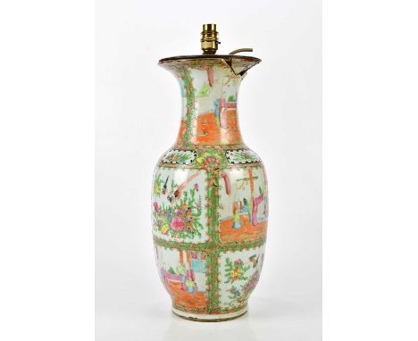 A late 19th century Chinese Canton Famille Rose vase converted to a table lamp, decorated with panels depicting figures and e