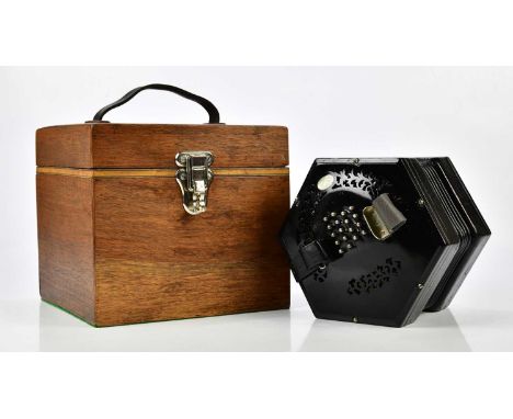 LACHENAL &amp; CO; an ebonised English thirty-five key concertina, no.50920, cased.Provenance: A local restorer has been in t