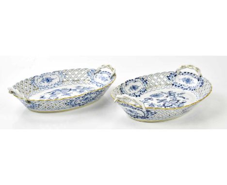 MEISSEN; a pair of 20th century twin handled baskets with rope twist handles and reticulated border, length 28cm (2)Condition