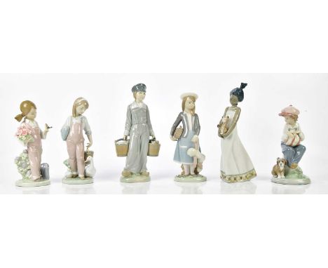 LLADRO; six figures including a young boy.Condition Report: All appear in good condition, the boy holding buckets has remnant