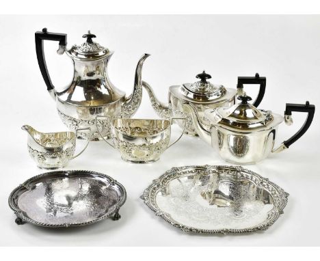 An early 20th century silver plated four piece tea service, a further silver plated tea pot and two salvers (7).