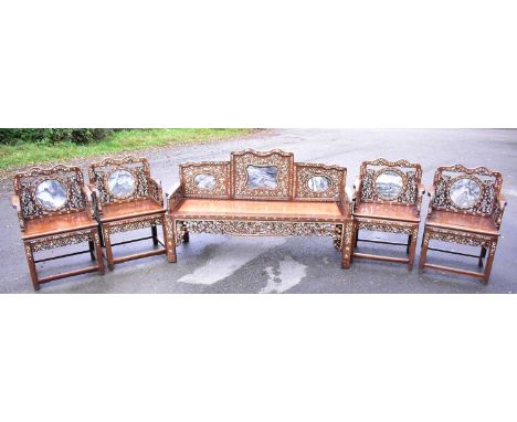 A good 19th century Chinese marble and mother of pearl suite, comprising of four arm chairs, 100 x 69 x 52cm, and settle, 108