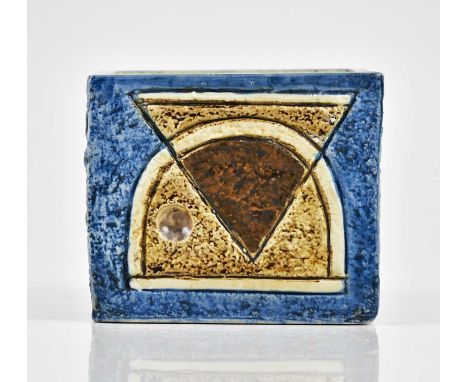 ALISON BRIGDEN FOR TROIKA POTTERY; a small cube vase with relief and incised decoration to each of the four sides in strong b