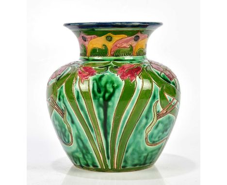 DELLA ROBBIA; a good Arts and Crafts ceramic vase with stylised floral decoration on a green glazed ground, height 16.5cm.Con