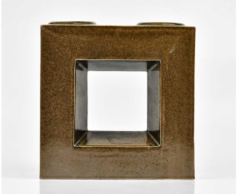 ROLAND BENCE FOR TROIKA POTTERY; a rare double candle holder finished in manganese glaze, signed Troika, Cornwall, with paint