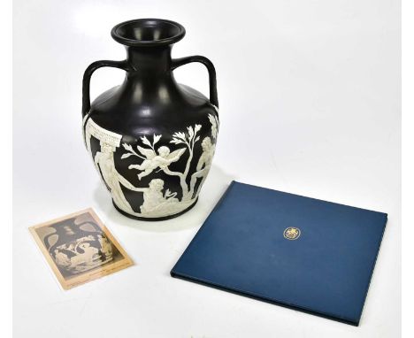 WEDGWOOD; an early 19th century Portland vase, relief decorated with classical figures, height 25cm, complete with Wedgwood b