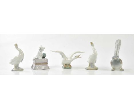 LLADRO; a group of animal figures comprising four birds and a dog model (5).