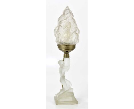 WALTHER &amp; SOHNE; an Art Deco frosted glass table lamp with flame shade, representing a nude female crouching supporting t