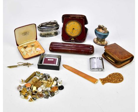 A mixed lot of collectors' items to include a Ronson table lighter, Swiss travelling clock, assorted shirt studs, etc.