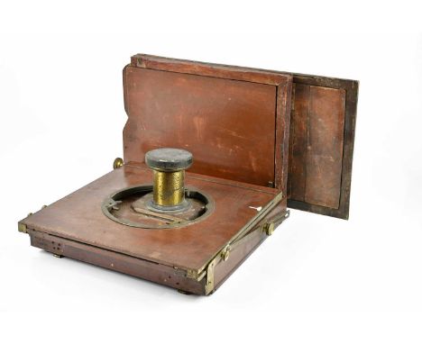 A 19th century part of a plate camera, to include lens and two slides.