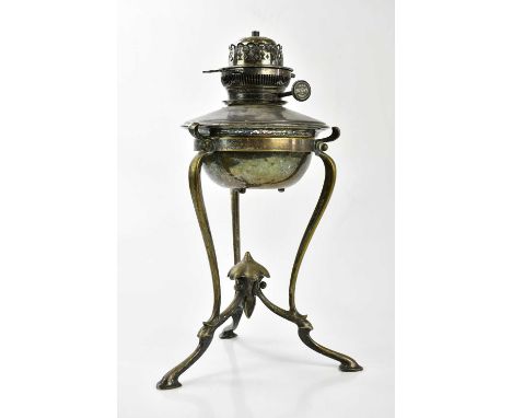 An Arts and Crafts silver plated table lamp in the manner of W.A.S Benson, with Hinks of Birmingham wick turner, height 42cm.