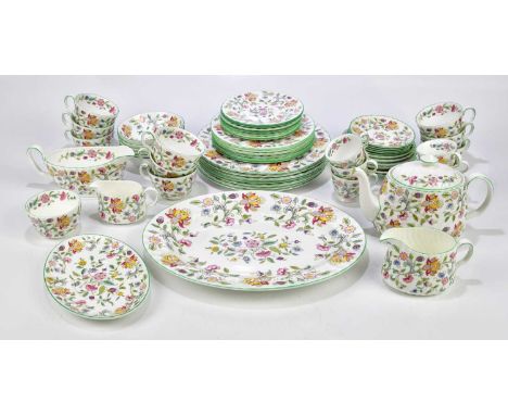 MINTON; a tea and dinner service in the 'Haddon Hall' pattern (seconds quality).