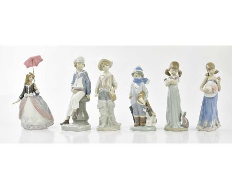LLADRO; six figures to include young boy sailing a yacht, etc.