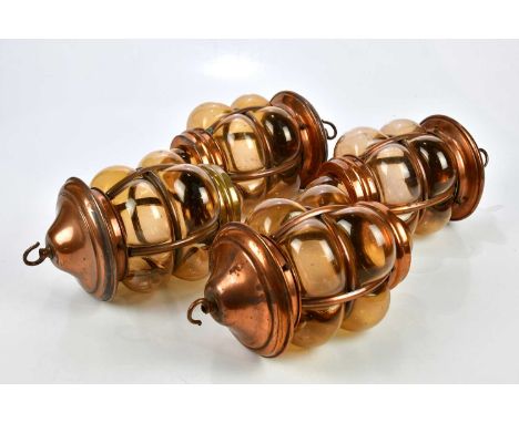 Four Arts and Crafts style copper and smoked glass hanging light shades, length 28cm (4).