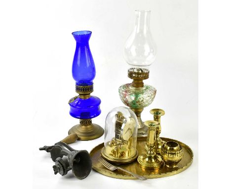 Two vintage oil lamps, a brass tray decorated with Oriental figures in landscape, a brass candlestick, an anniversary clock, 