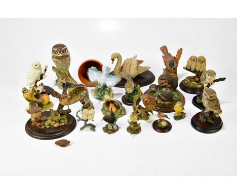 A small collection of assorted ceramic figures, including Border Fine Arts, Country Artists, Porcelain Models, etc.
