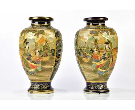 A pair of modern Satsuma vases decorated with figures, height 38cm.