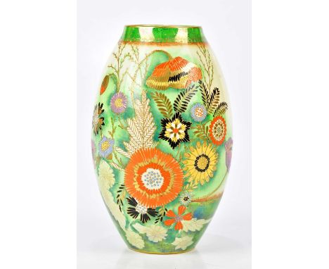 CARLTONWARE; an Art Deco hand painted vase with floral sprays in a landscape scene, height 20.5cm.Condition Report: Wear and 