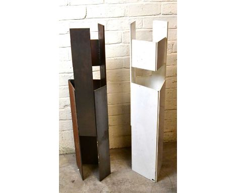 † CHARLOTTE MAYER (1929-2022); 'Double Steel Tower', a pair of hard-edged geometric steel sculptures, one coated in stone ena