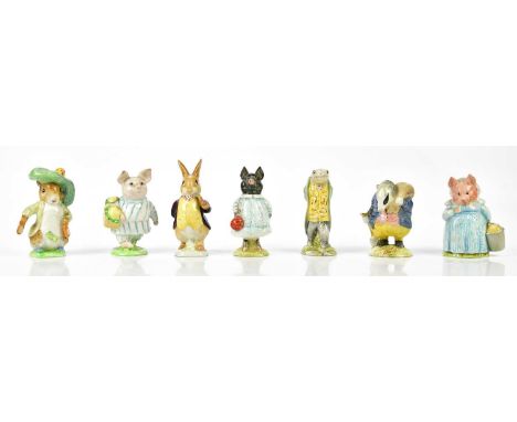 BESWICK; a collection of seven Beatrix Potter figures including Tommy Brock, Little Pig Robinson (gold back stamp), Benjamin 