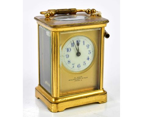 W. MAHR; an eight day carriage clock, the white enamelled dial set with Arabic numerals, height 11cm.