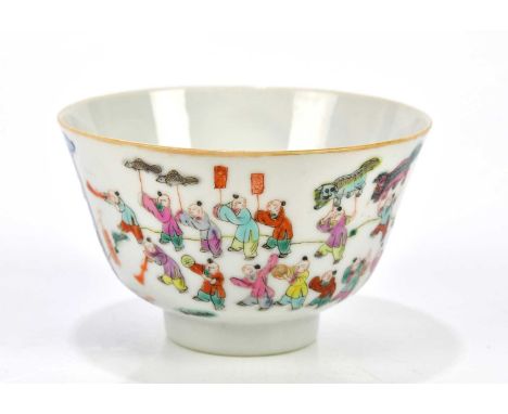 A Chinese Famille Rose porcelain footed bowl decorated with figures with shishi dogs and dragon balloons, bears Chen Lung sea