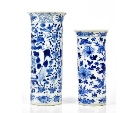 Two late 19th century Chinese blue and white porcelain sleeve vases, to include an example decorated with figures beside a va