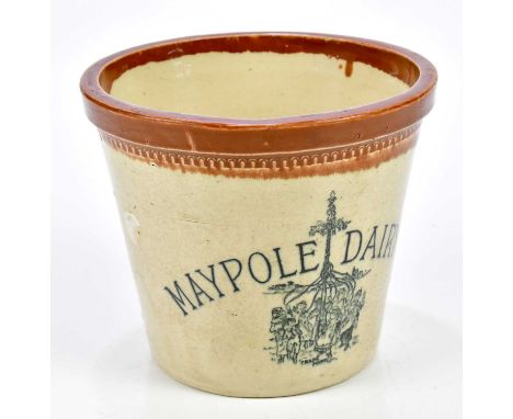 A Maypole Dairy advertising 4lb butter crock with handle, height 15cm.Condition Report: Light wear with scratches and scuffs,