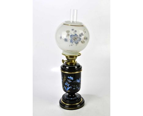 A Victorian black painted drop-in fount oil lamp, expertly restored and all original including the under-layered glass globe 