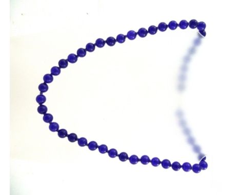 A UNIFORM ROW RUSSIAN AMETHYST SPHERICAL BEAD NECKLACE, weighing 65g, with gold coloured metal clasp stamped 9ct, 52cm long 