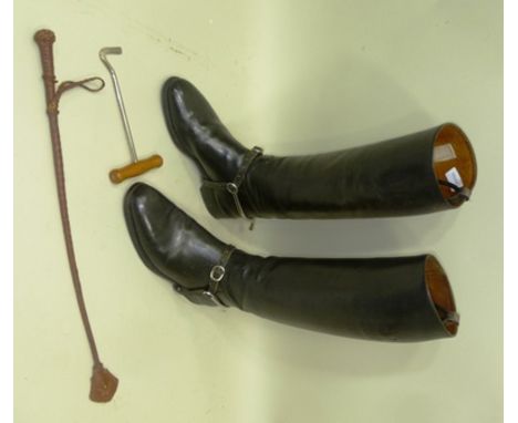 A PAIR OF BLACK HUNTING BOOTS by D. Davies of Brynmawr (approx size 9), together with a pair of boot pulls and a riding crop 