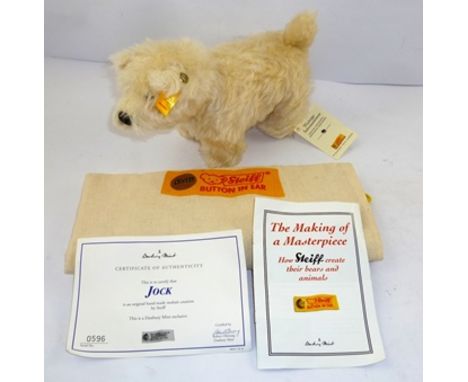 A STEIFF HAND-MADE TERRIER "Jock" in white mohair, serial no.0596, with label, certificate and canvas storage bag 