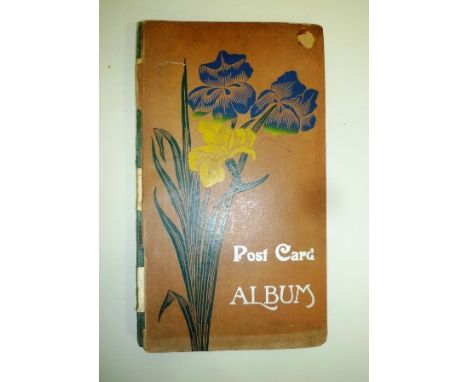 A POSTCARD ALBUM, includes humorous, Christmas, Louis Wain, approximately 96 cards 