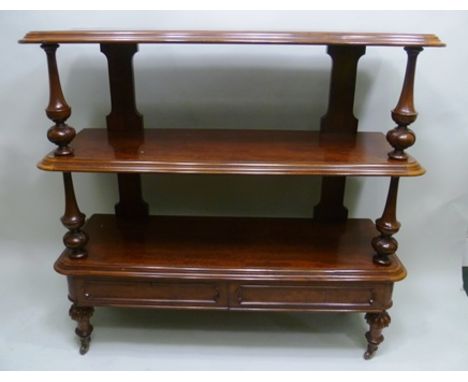 A VICTORIAN MAHOGANY THREE TIER DUMB WAITER turned vase and globe fore spacers, under tier frontal two frieze drawers raised 