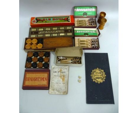 A COMPENDIUM OF BOXED GAMES including; Table Boules by William Lindop, a mother of pearl inlaid cribbage board, darts, draugh