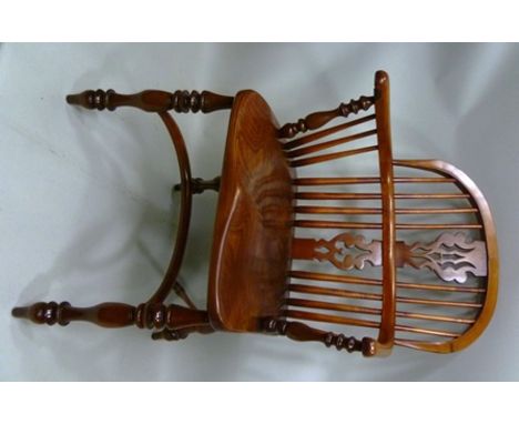 A GEORGIAN DESIGN LOW COMB BACK OPEN ARM PROVINCIAL CHAIR, having pierced yew splat, with shaped burr elm seat, the turned su